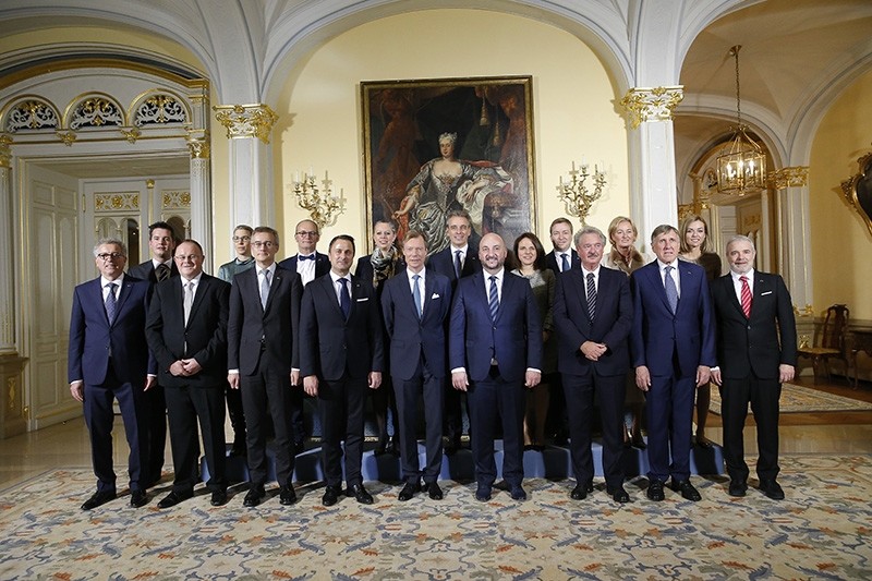 Grand Duke Henri of Luxembourg (C) and Luxembourg Prime Minister Xavier Bettel (4-L) pose with the new Government at the Grand Ducal Palace in Luxembourg, Dec. 5, 2018. (EPA Photo)