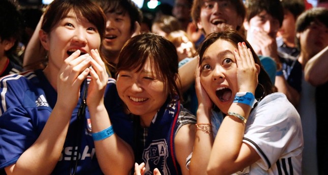 مشجعون يابانيون في مونديال قطر رويترز