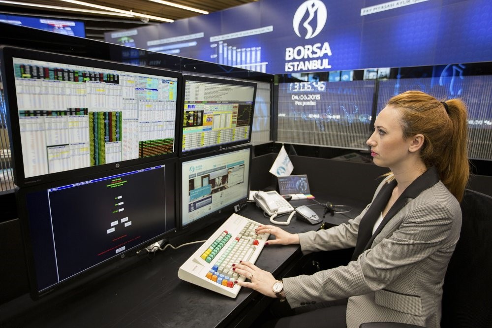 A trader works in the Borsa Istanbul building. The foreign exchange rate on the Borsa Istanbul reached its highest level since November 2015 with a 65.2 percent in April.