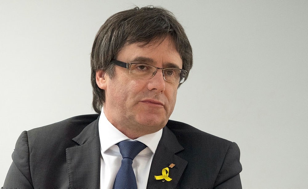Former Catalan leader, Carles Puigdemont, attends a a meeting with members of the Junts per Catalunya party,  in a hotel in Berlin, Saturday, April 5, 2018. (dpa via AP)
