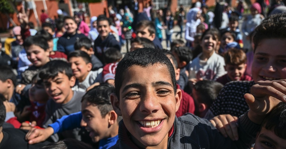 Syrian students play during their break in southern Adana province, March 18, 2019.