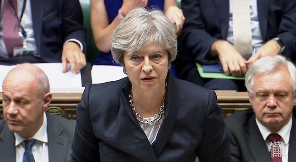 Britain's Prime Minister Theresa May addresses deputies in the House of Commons, London.