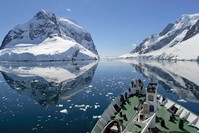 A small cruise ship passes through the Lemaire Channel in Antarctica. (FILE Photo)
