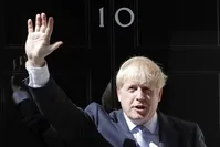 Britain's Prime Minister Boris Johnson waves from the steps outside 10 Downing Street, London, July 24, 2019. (AP Photo)
