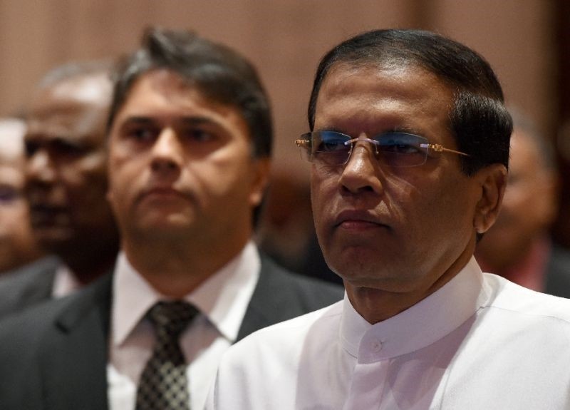 Sri Lanka's President Maithripala Sirisena (right) pictured in Colombo on December 19, 2016 (AFP Photo)