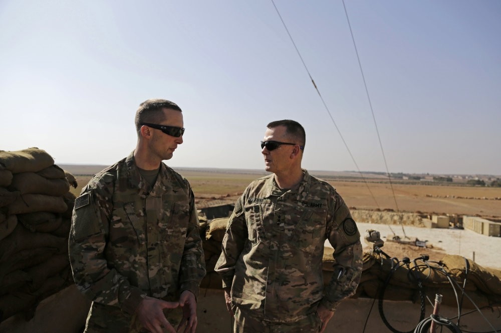 Two members of the U.S. Army at an American outpost in Manbij as part of Washington's support of PKK-linked Syrian nonstate groups, Syria, Feb. 7. 