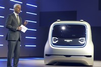 Volkswagen CEO Matthias Mueller presents a Sedric Concept car during a Volkswagen event prior to the 87th Geneva Auto Show in Switzerland.