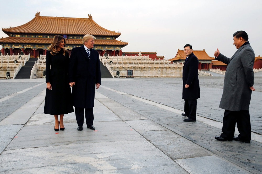 U.S. President Donald Trump and his wife first lady Melania Trump (L) visit China's Forbidden City with Chinese President Xi Jinping (R), Beijing, November 2017.