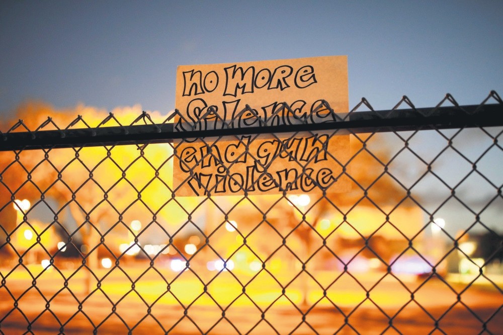 A note on the fence of Marjory Stoneman Douglas High School following a mass shooting, in Parkland, Florida, Feb. 21. 