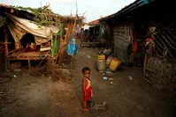 A Rohingya boy stands in a refugee camp outside Kyaukpyu in Rakhine state, Myanmar, May 18.
