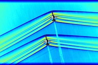 This handout colorized composite image released by NASA on March 5, 2019 shows two T-38 aircrafts flying in formation at supersonic speeds producing shockwaves that are typically heard on the ground as a sonic boom. (AFP Photo)