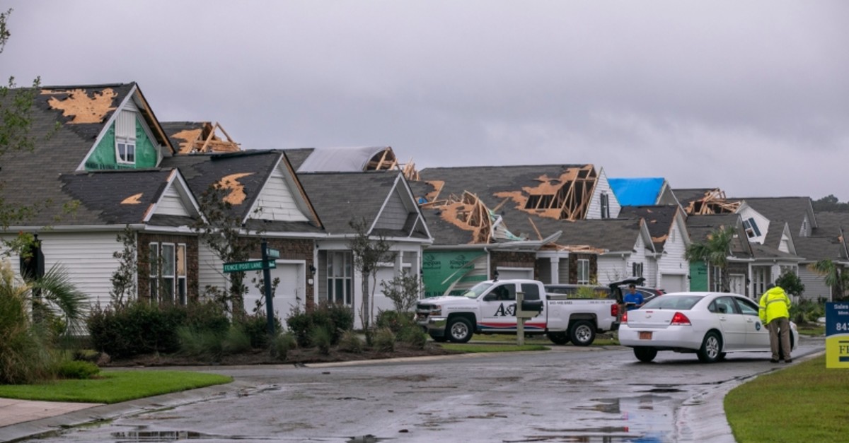 A tornado touched down in the The Farm at Brunswick County in Carolina Shores, N.C. on Thursday, Sept. 5, 2019, damaging homes ahead of Hurricane Dorian's arrival. (The Sun News via AP)