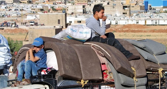 لاجئون سوريون في لبنان اختاروا العودة طوعاً لسوريا الفرنسية