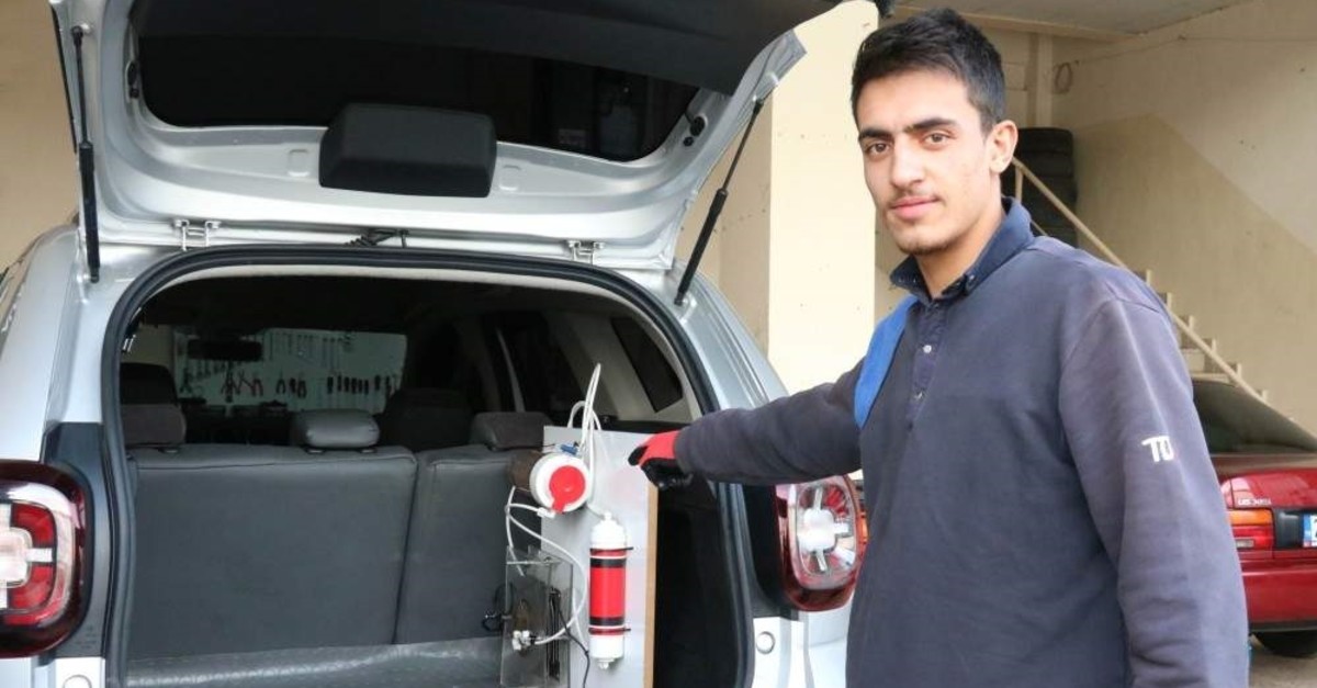 Turkish inventor Au011fbau015f shows the water storage unit he built for his car. (?HA)
