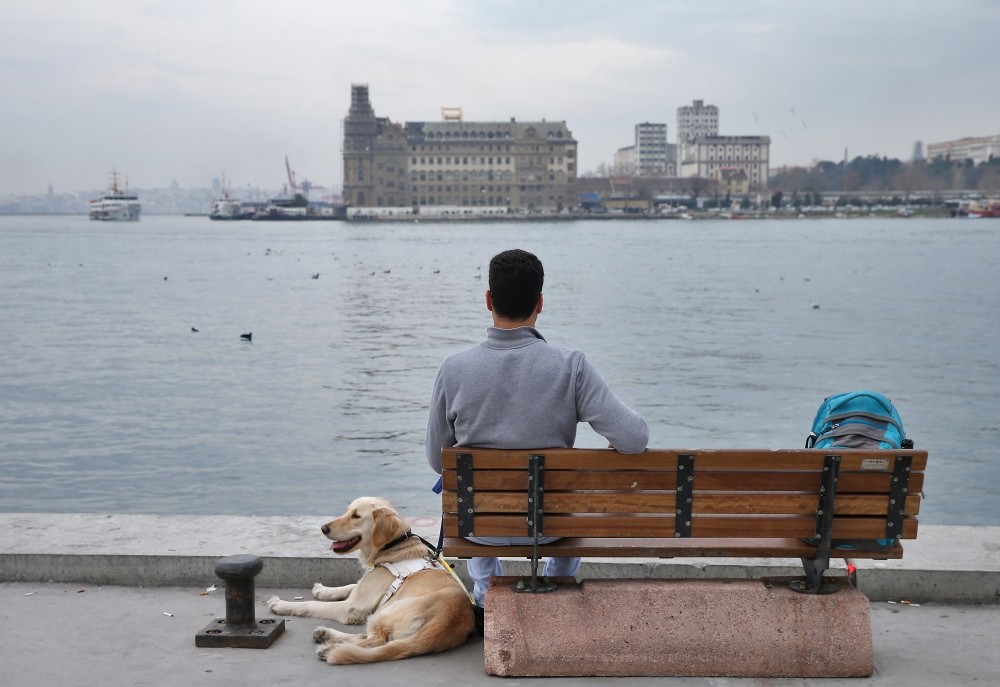 Aslan, accompanies Uu00e7ar during one of their trips along the Bosporus.