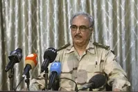 Putschist Gen. Khalifa Haftar speaks during a news conference at a sports club in Abyar, a small town to the east of Benghazi. May 17, 2014. (Reuters File Photo)