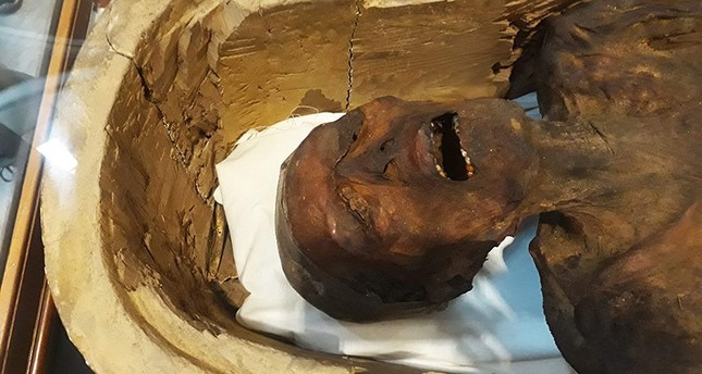 A picture taken on February 14, 2018 shows the Screaming Mummy known scientifically as the unknown man E on display at the Egyptian Museum in Cairo's Tahrir Square. (AFP Photo)