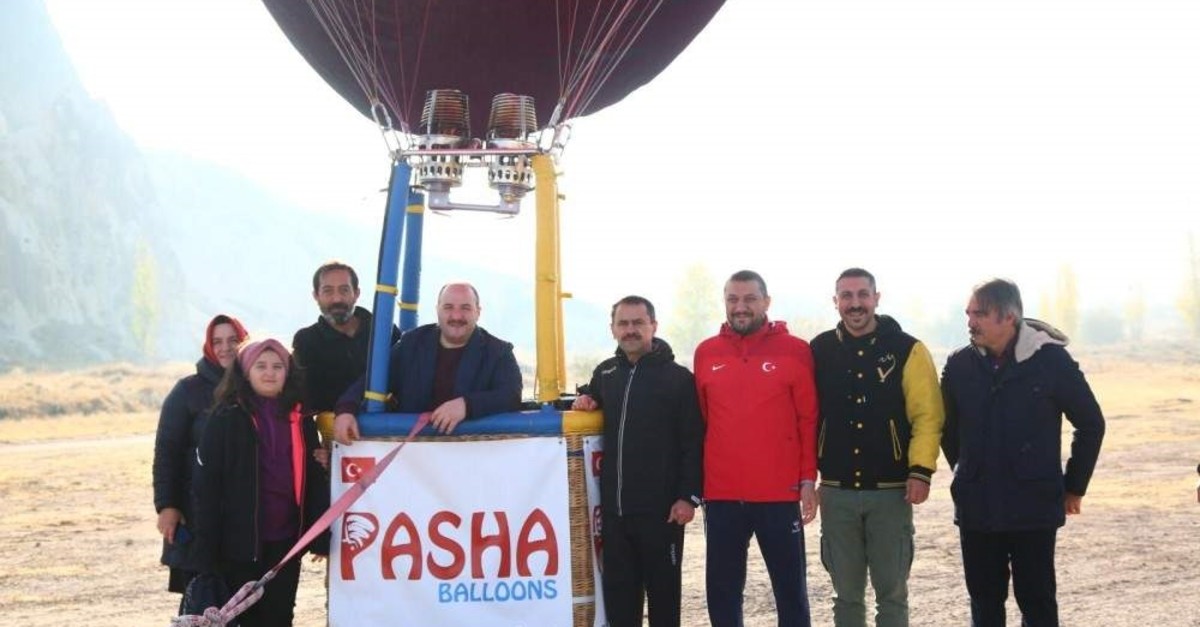 Industry and Technology Minister Mustafa Varank flew over the Cappadocia skyline, riding the first domestically produced hot air balloon, Nev?ehir, Nov. 18, 2019. (AA Photo)