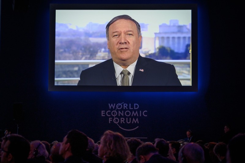 U.S. Secretary of State Mike Pompeo is seen on a screen during his address via satellite at the World Economic Forum (WEF) annual meeting, on January 22, 2019 in Davos, eastern Switzerland. (AFP Photo)