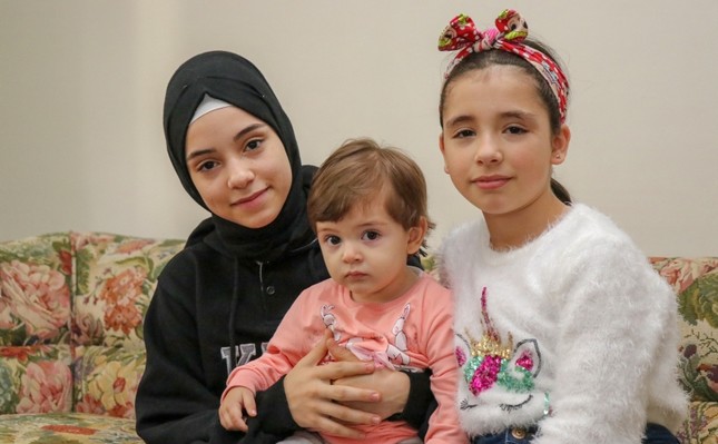 https://iadsb.tmgrup.com.tr/ea4f77/645/399/0/22/800/517?u=https://idsb.tmgrup.com.tr/2019/12/09/syrian-sisters-ask-world-community-to-help-war-victims-1575892740854.jpg