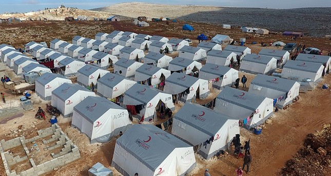 This aerial photo dated Aug. 18, 2017, shows the Kemmune refugee camp established by the Turkish Red Crescent north of Idlib, Syria. (AA Photo).