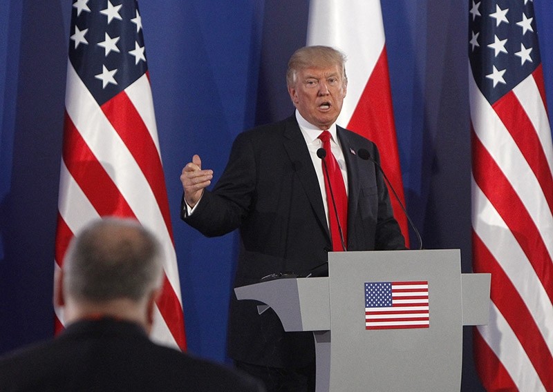 U.S. President Donald Trump gestures while answering a question during a joint press conference with Poland's President Andrzej Duda, in Warsaw, Poland, Thursday, July 6, 2017. (AP Photo)