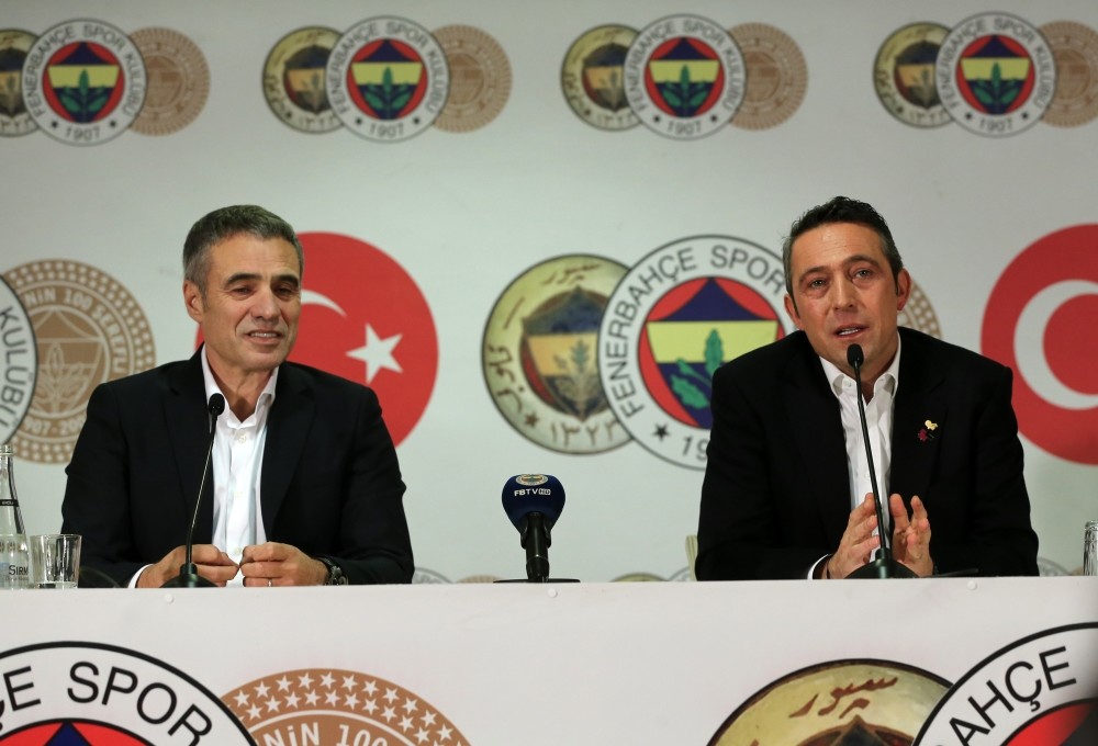 Ersun Yanal (L) and Ali Kou00e7 speak at a press conference and signing ceremony, Dec. 18.