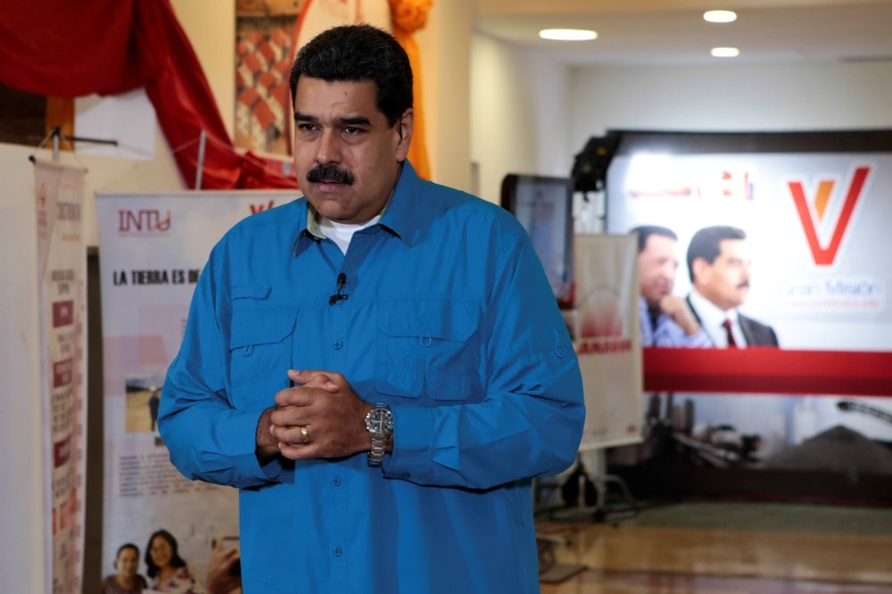 Venezuelau2019s President Nicolas Maduro speaks during his weekly broadcast u201cLos Domingos con Madurou201d (Sundays with Maduro) in Caracas.