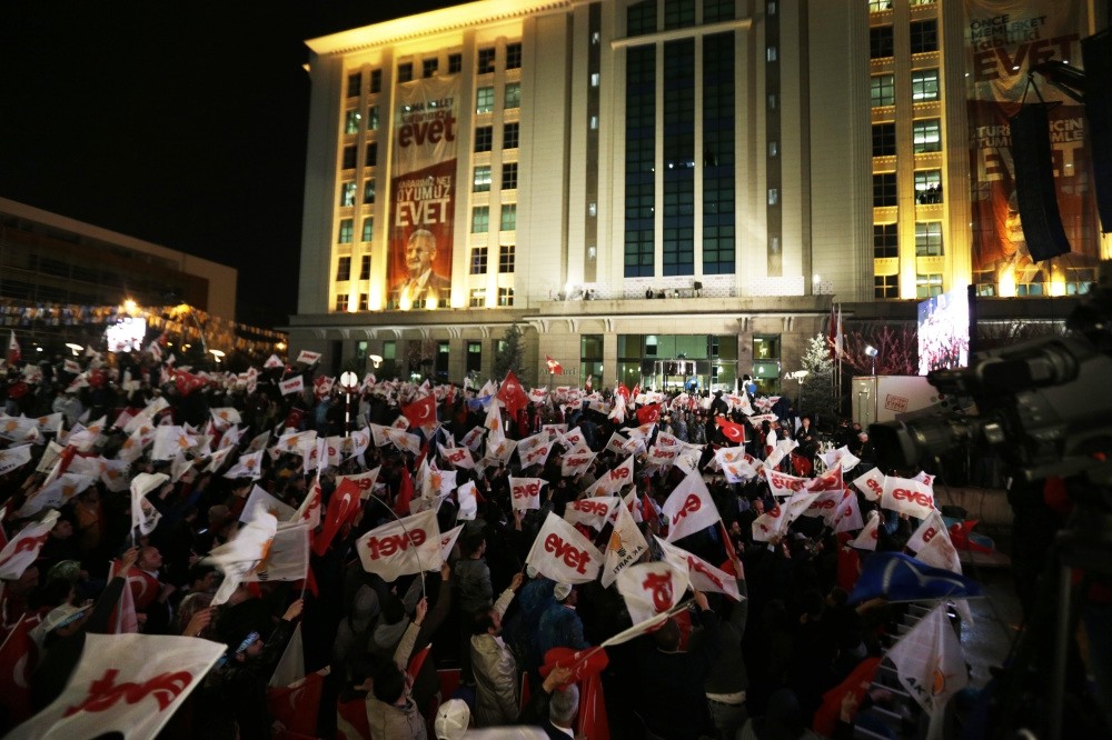Turkish people waving 'yes' flags to celebrate the referendum victory of the 'yes' campaign on Sunday in Ankara, April 16.
