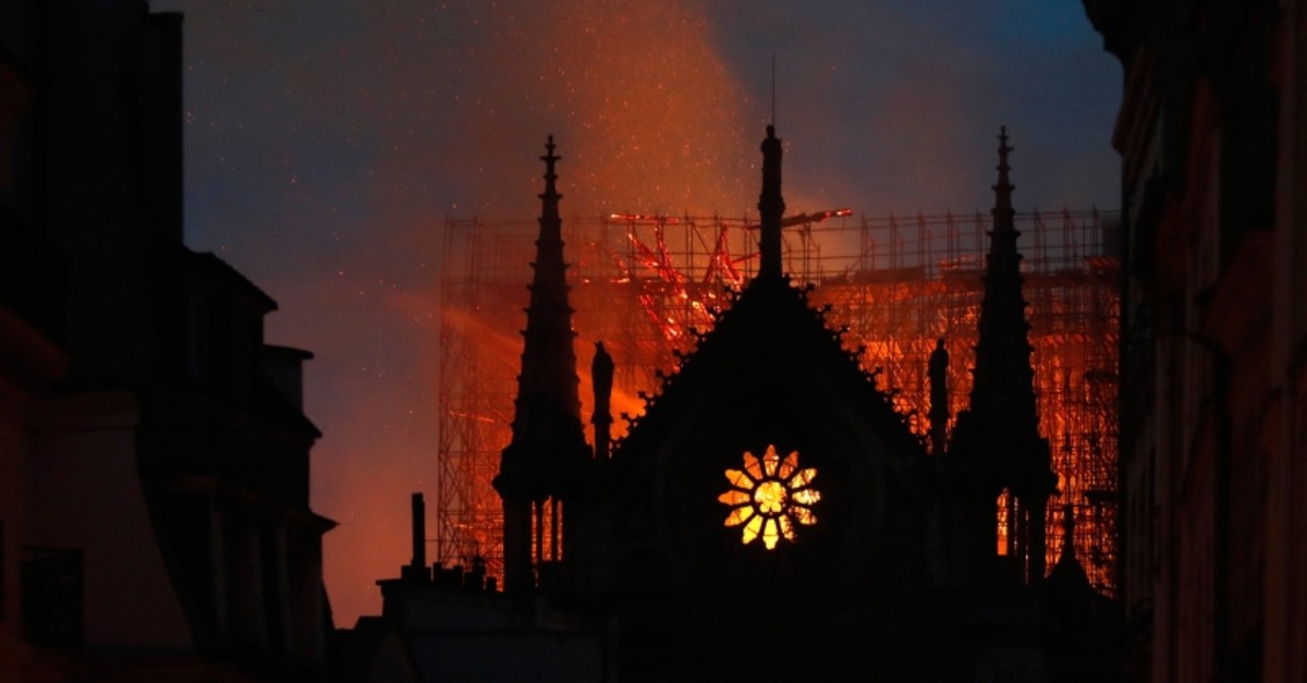 Flames and smoke rise from Notre Dame cathedral as it burns in Paris, Monday, April 15, 2019. (AP Photo)