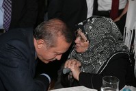 President Recep Tayyip Erdou011fan listens to u015eule Yu00fcksel u015eenler in this undated photo. The president described u015eenler as ,a pioneer, and ,a valuable writer who devoted her life to raising consciousness among the youth.,