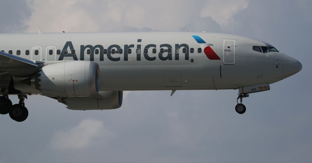 An American Airlines Boeing 737 Max 8, on a flight from Miami to New York City, comes in for landing at LaGuardia Airport in New York, March 12, 2019. (AFP Photo)