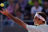 Roger Federer of Switzerland serves the ball to Borna Cedric of Croatia at the Italian Open tennis tournament, in Rome, Thursday, May 16, 2019. (AP Photo)