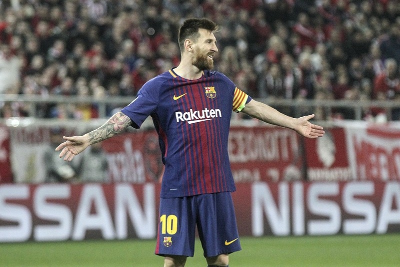 Lionel Messia playing for Barcelona at a UEFA Champions League match against Olympiakos (AA Photo)