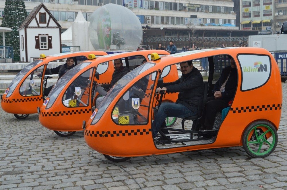 Environment friendly ,cab bikes,, similar to iconic ,tuk tuk,, haul commuters free of charge.