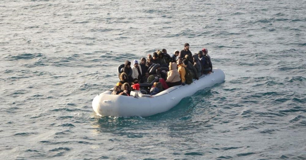 A group of illegal migrants stopped by the Turkish Coast Guard in Karaburun, another district of Izmir, Jan. 4, 2019. (?HA Photo)