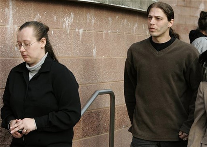 In this March 12, 2009 file photograph, Isidore Heath Campbell, right, and his wife, Deborah, leave a court in Flemington, N.J., after a hearing to determine custody of their three children with Nazi-inspired names. (AP Photo)