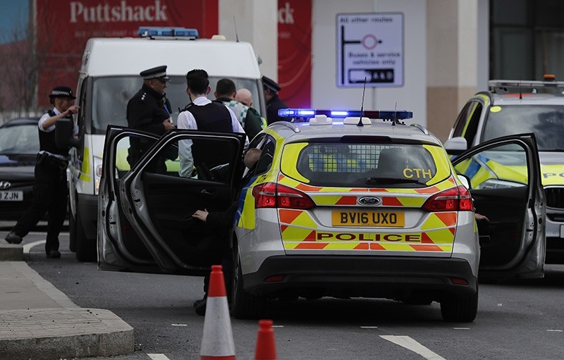 British police respond to an incident at Westfield shopping center in London, Friday, March 23, 2018, one of the largest shopping malls in Europe. (AP Photo)