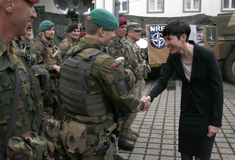 Norway's defense minister Ine Eriksen Soereide greets a Norwegian soldier during a visit to the Very High Readiness Joint Task Force (VJTF) unit in Muenster, Germany, June 22, 2015. (Reuters Photo)