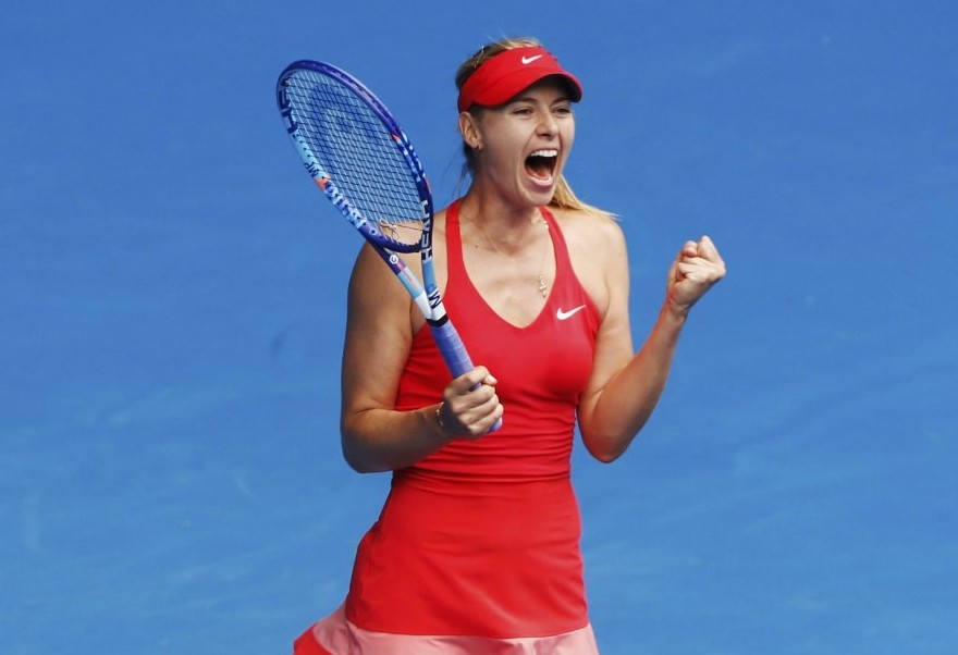 Maria Sharapova celebrates after defeating Eugenie Bouchard of Canada in their womenu2019s singles quarter-final match at the Australian Open 2015 tennis tournament in Melbourne.