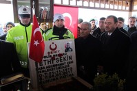 People gather at Fethi Sekin's grave to remember the policeman, Elaz??, Jan. 5, 2020. (AA Photo) 
