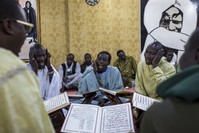 Senegalese migrants recite hymns in a religious ritual in Istanbul. The city is home to a large expat population from African countries.