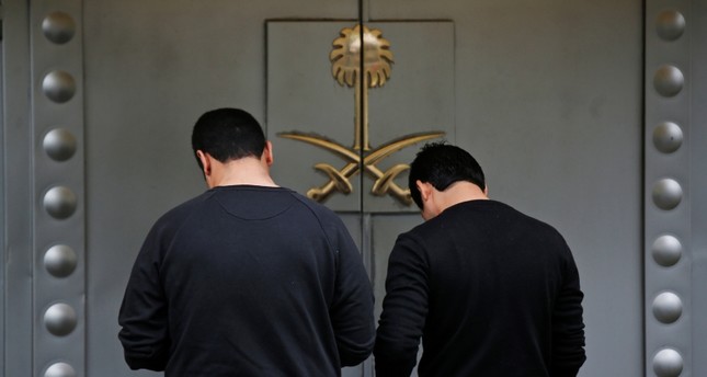 People wait to enter Saudi Arabia's Consulate in Istanbul, Monday, Oct. 15, 2018. (AP Photo)
