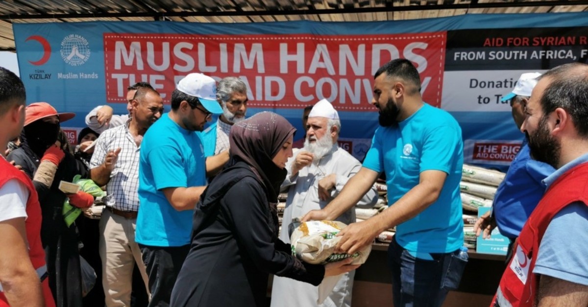 Charity officials delivered packages of rice to Syrian refugees in the southern province of Hatay, Aug. 8, 2019.