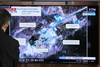 In this March 6, 2019 file photo, a man watches a TV screen showing an image of the Sohae Satellite Launching Station in Tongchang-ri, North Korea, during a news program at the Seoul Railway Station in Seoul, South Korea. (AP Photo)