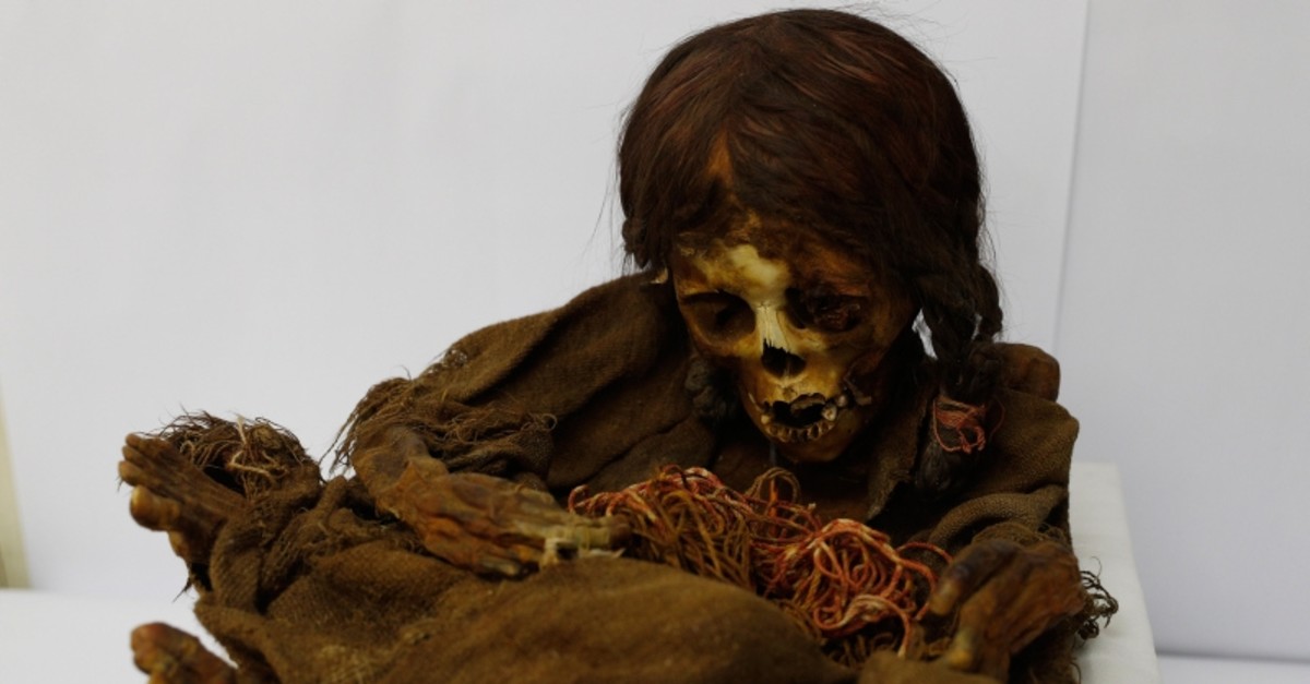 In this Aug. 15, 2019 photo, the 500-year-old mummy of an Incan girl sits inside a vault at the National Museum of Anthropology in La Paz, Bolivia (AP Photo)