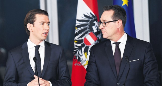 Austrian foreign minister and the leader of the Austrian Peoples Party Sebastian Kurz (L) and the head of the right-wing Austrian Freedom Party Heinz-Christian Strache attend a news conference at Kahlenberg hill in Vienna, Austria, Dec. 16.