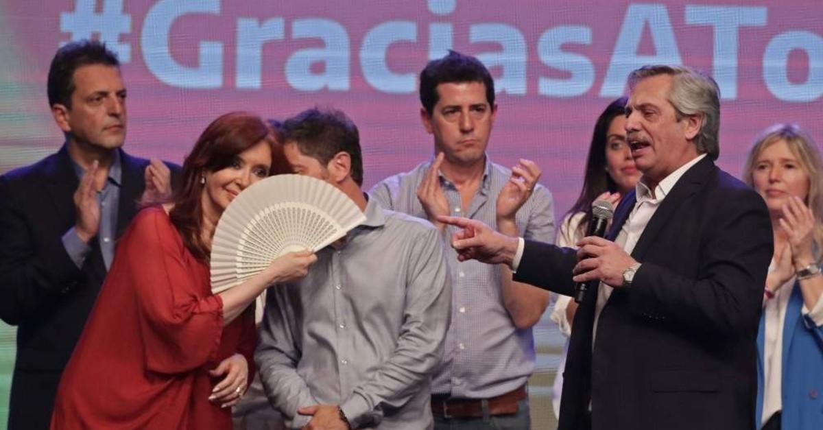 Argentina's president elect Alberto Fernandez, right, delivers a speech next to running mate, former President Cristina Fernu00e1ndez, left, in Buenos Aires, Argentina, Sunday, Oct. 27, 2019. (AFP Photo)