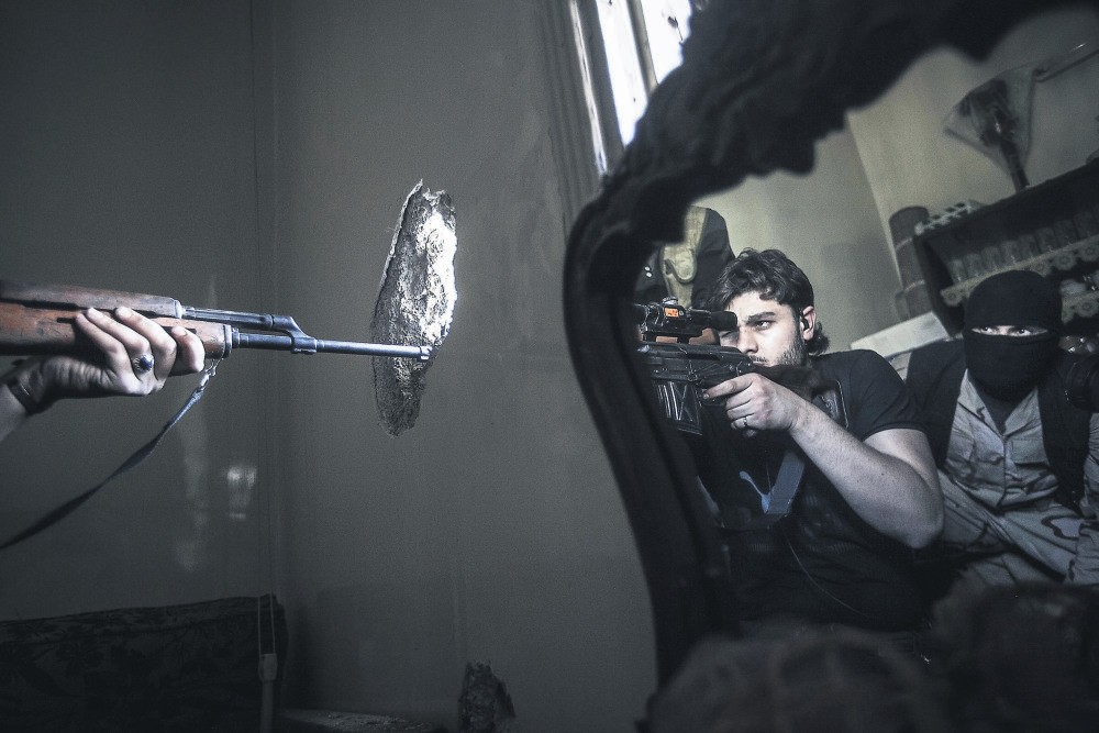 This photo of a rebel sniper taking aim, reflected on a mirror in Aleppo, Syria, won Contreras the Pulitzer Prize in 2013.