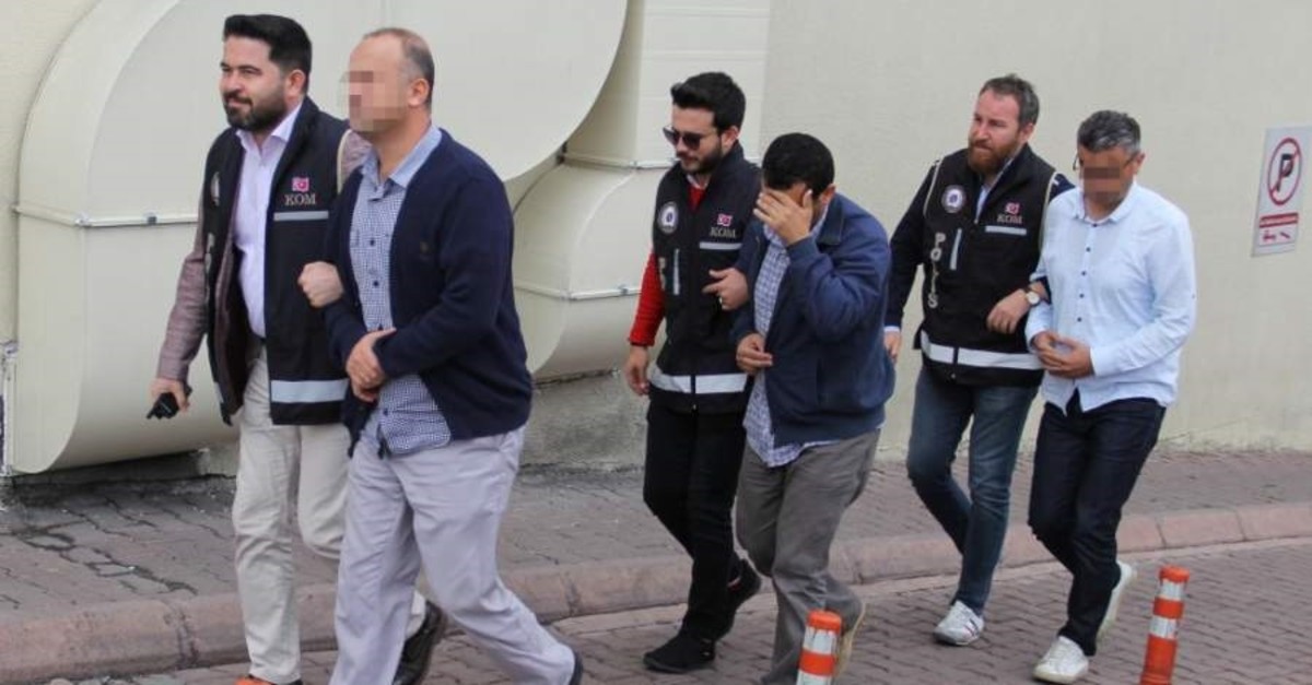 Police escort three suspects to the courthouse after they were arrested in operations in Kayseri, Oct. 22, 2019. (DHA Photo) 